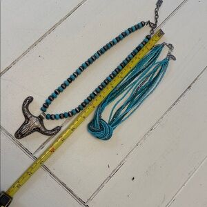 Two Turquoise and Silver Beaded Necklaces.  Long horn skull